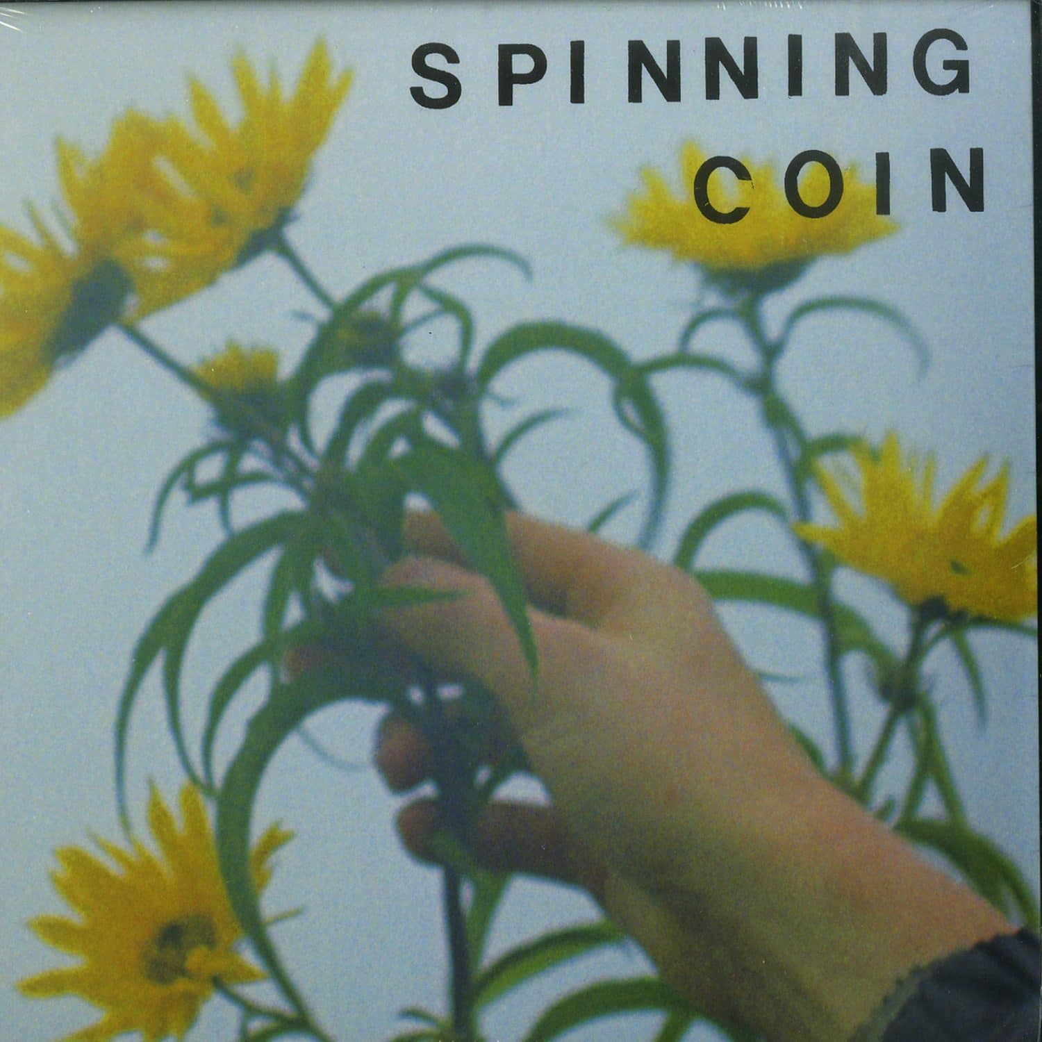 Spinning Coin - RAINING ON HOPE STREET 
