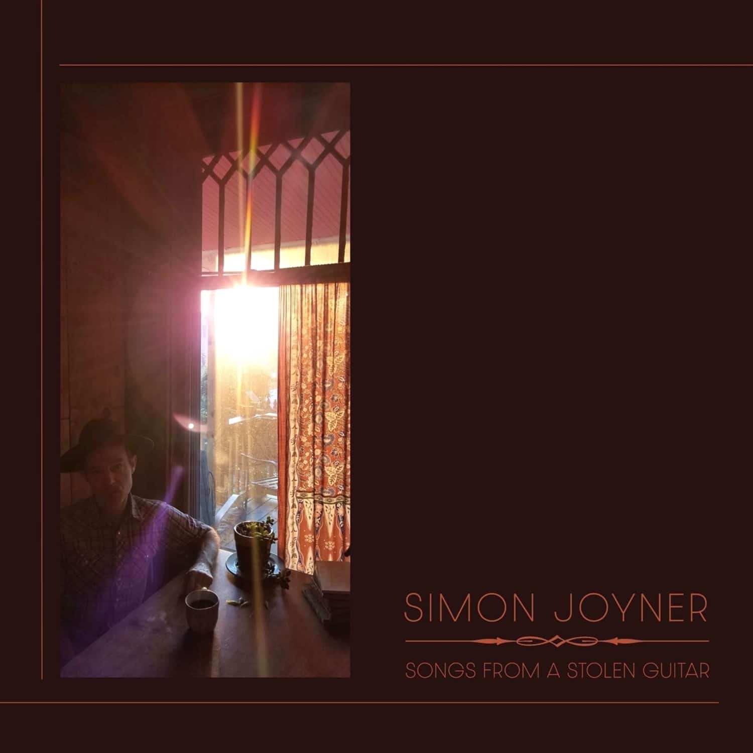 Simon Joyner - SONGS FROM A STOLEN GUITAR 