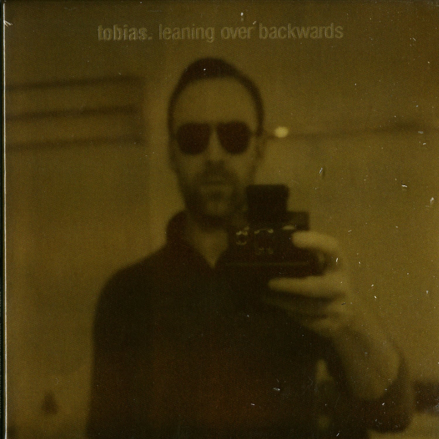Tobias. - LEANING OVER BACKWARDS 